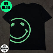 A black short-sleeve t-shirt, featuring a large UV smiley face